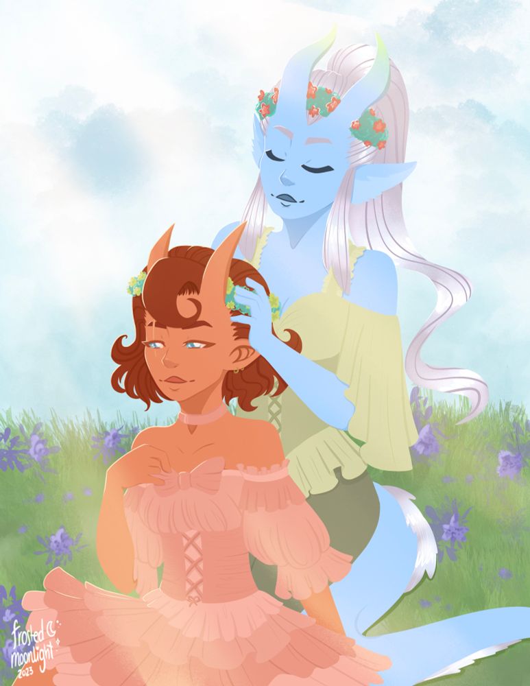 A light blue tiefling is sitting on her knees behind a light orange tiefling, also sitting on the grass with purple flowers surrounding both of them. The blue tiefling in the back has long horns that become more greenish at the tip and silver hair in a ponytail with two strands of hair framing her face. She has a green and red flower crown on and has fluffy elf ears that are also light blue. She is wearing an off the shoulder light green top with flowy sleeves and a darker green corset with even darker green pants. On her side is her light blue tail, with silver fur on its ridge that continues off screen. The orange tiefling has bright blue eyes with a scar on her right eye. They also have horns that are slightly shorter than the blue tiefling’s. They have auburn hair that cuts off above the shoulder, with a hair strand that covers their forehead between the horns. They also wear a flower crown with green leaves and lime flowers. She is wearing a salmon-colored choker with a matching frilly off the shoulder dress, with poofy sleeves, a matching darker pink corset and a salmon-colored layered skirt. The blue tiefling is playing in the orange tiefling’s hair. 