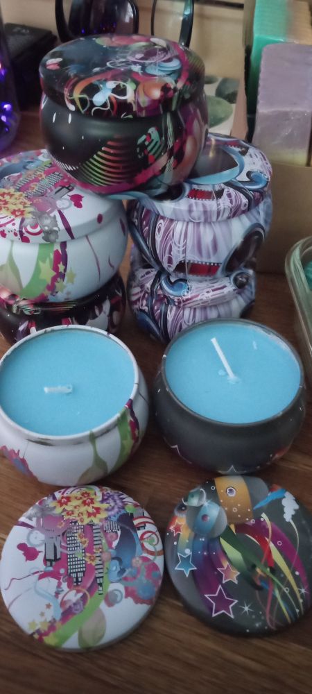 Handmade candles in decorative containers 