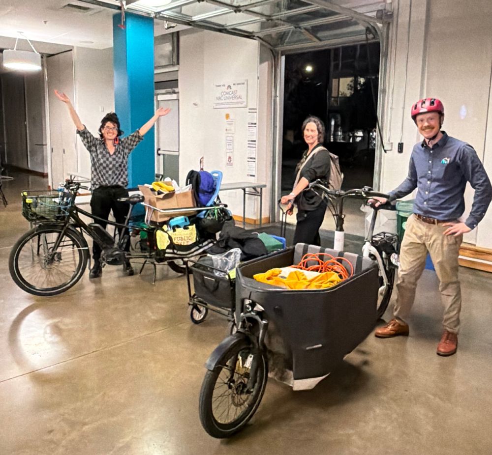 Clara, Rebecca, Gordon. two cargo bikes and one wagon that will be rolled on transit