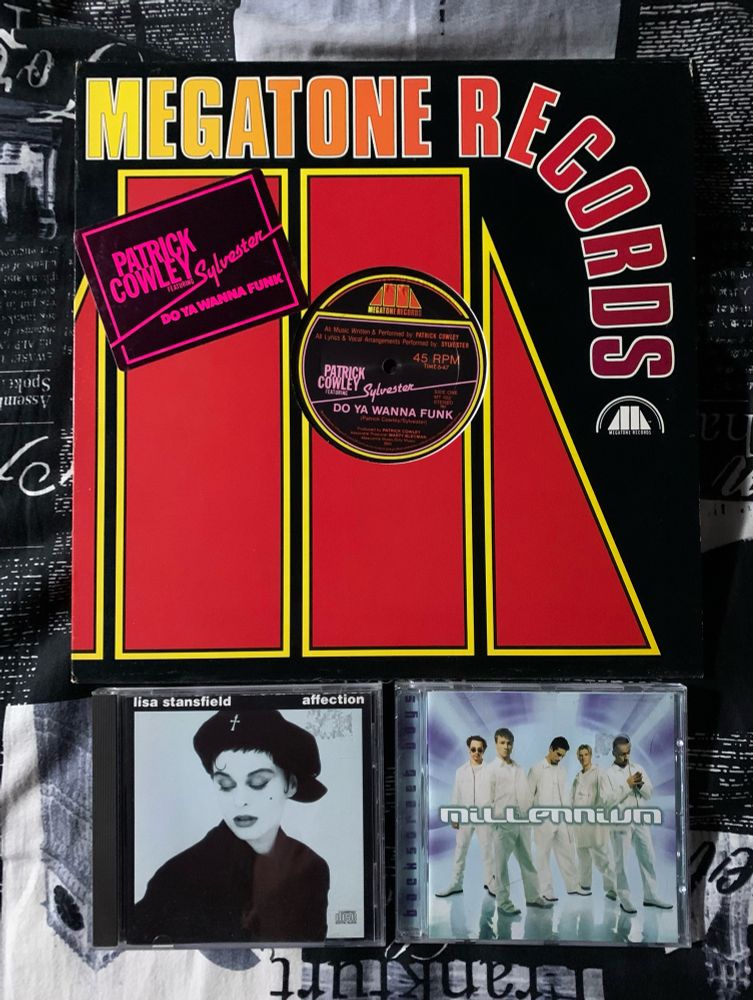 top: 12” of “Do Ya Wanna Funk” by Patrick Cowley featuring Sylvester
bottom left: CD of “Affection” by Lisa Stansfield
bottom right: CD of “Millennium” by the Backstreet Boys