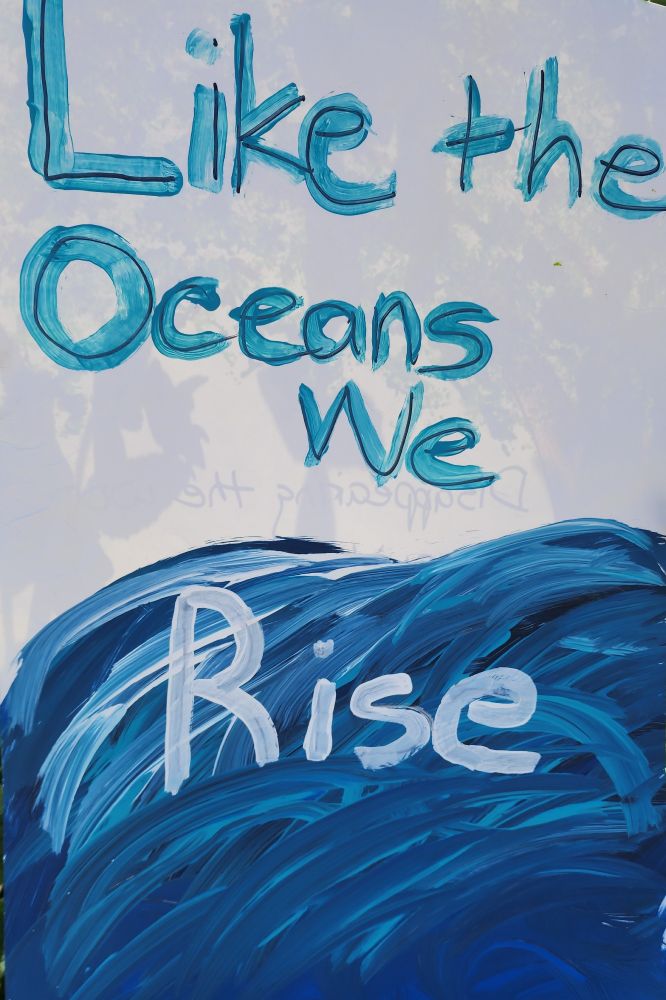 Like the oceans we rise. Blue, aqua waves.