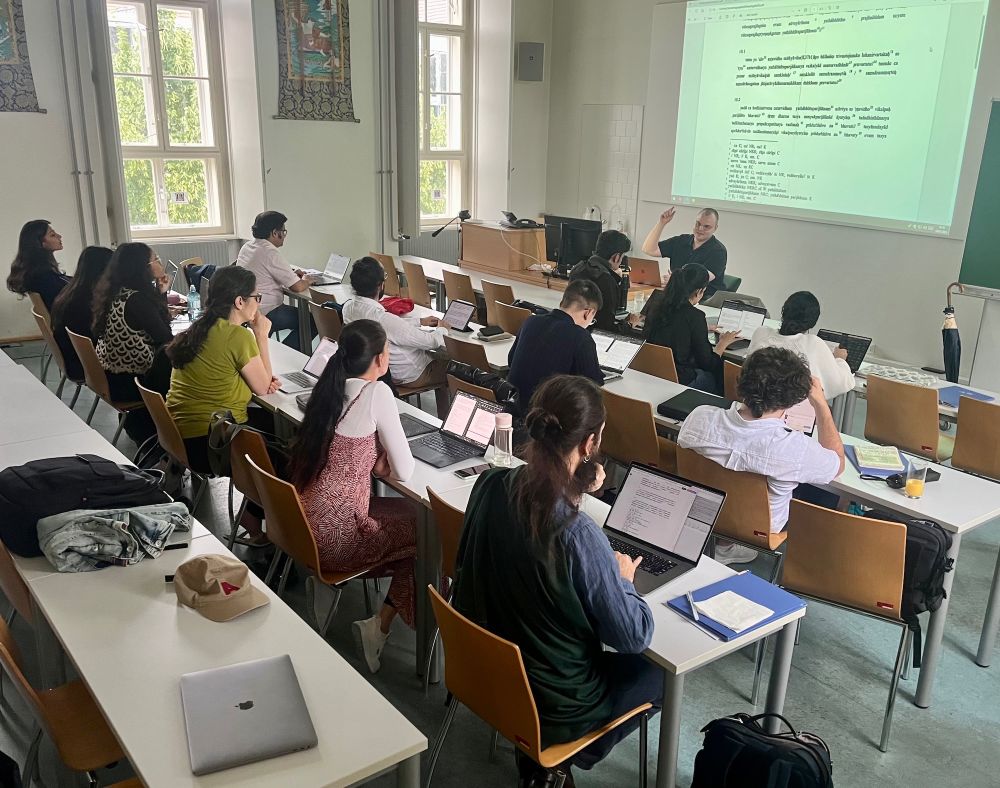 Teacher and students in class.