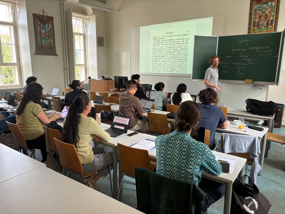 Teacher and students in class.