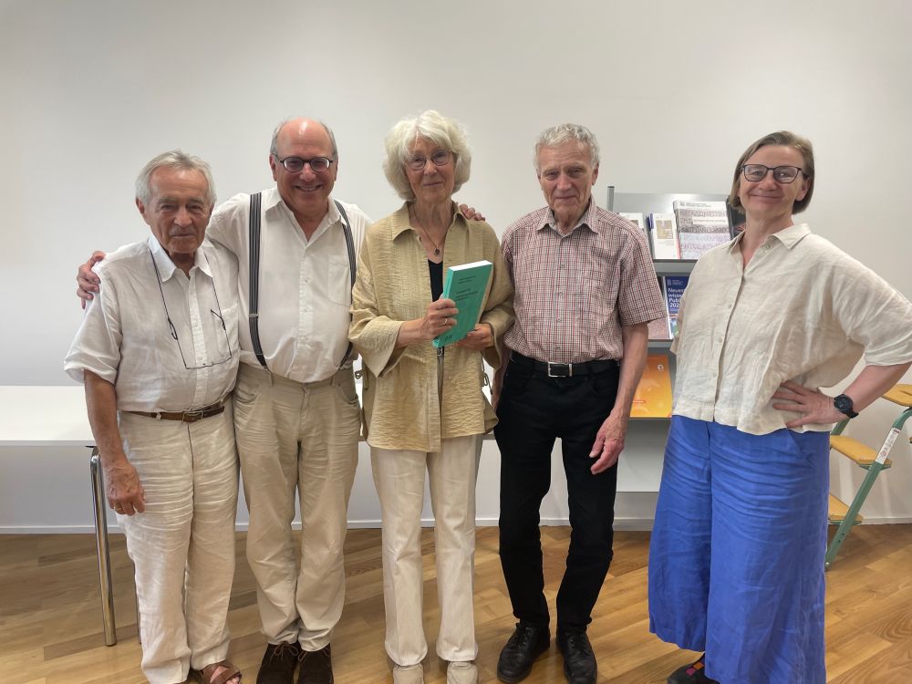 A group of people smiling at the camera