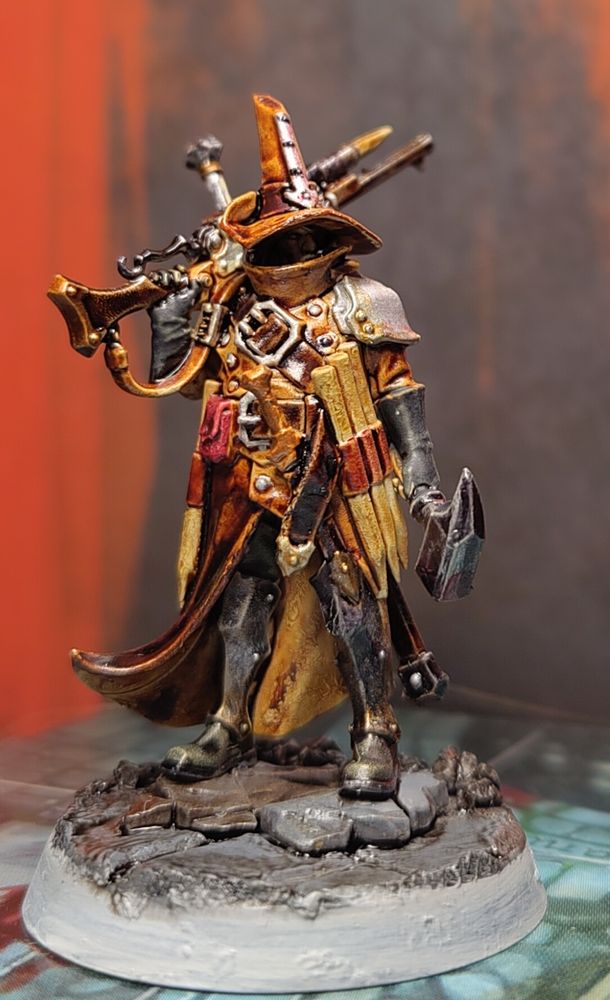 Warhammer Quest Cursed City miniature of Jelsen, a man decked out in traditional van Helping style vampire hunter or witch hunter attire, conical hat, rifle that shoots stakes, and countless stakes attached to his belt festooned with other weapons and equipment.