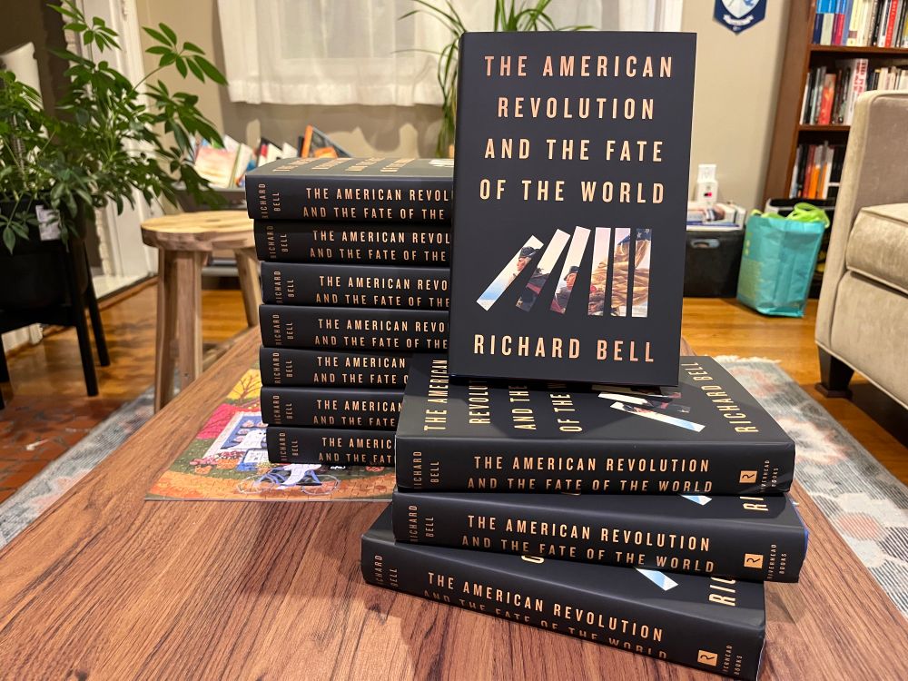 A stack of new hardcovers of Richard Bell’s new book The American Revolution and the Fate of the World.