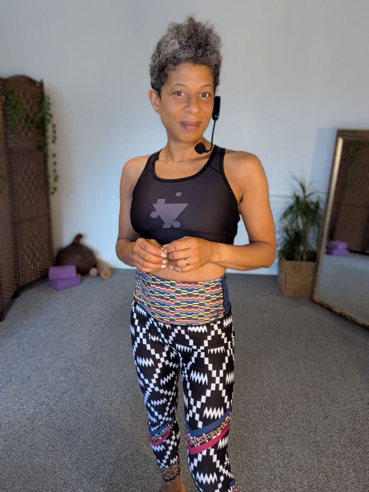 African dance fitness coach in her kit by Tyna Active wear. 