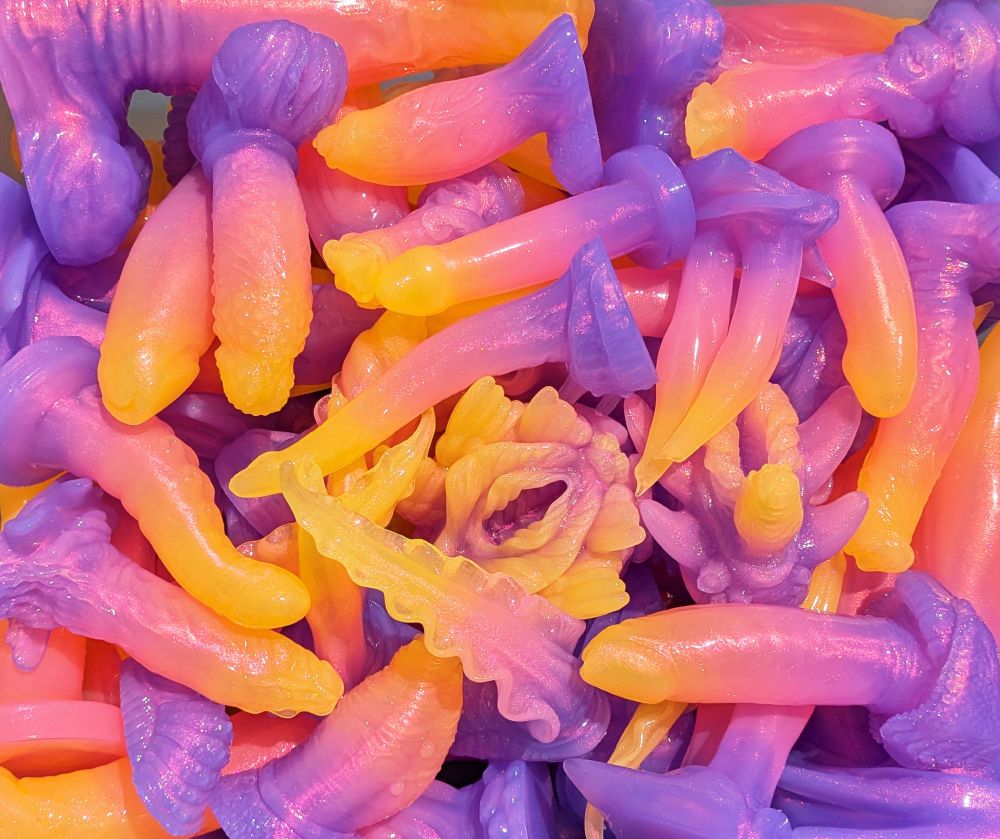 very sparkly sunset colored silicone sex toys