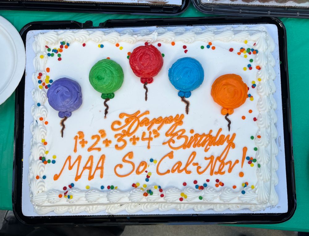 Cake with icing text that says “Happy 1^3+2^3+3^3+4^3 Birthday MAA SoCal-Nev!”