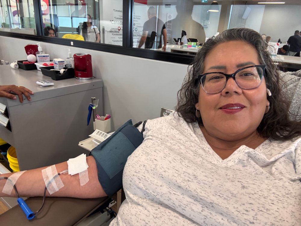I’m sitting in a chair donating blood. 