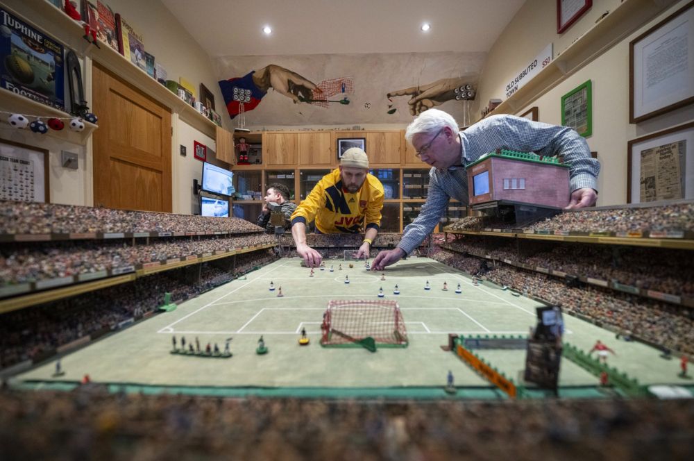 Subbuteo enthusiasts play in Stephen Morton’s house in Essex