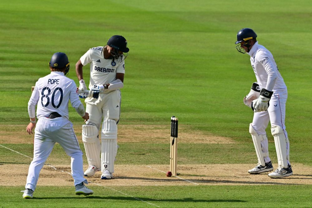 Mohammed Siraj watches the ball dislodge a single bail