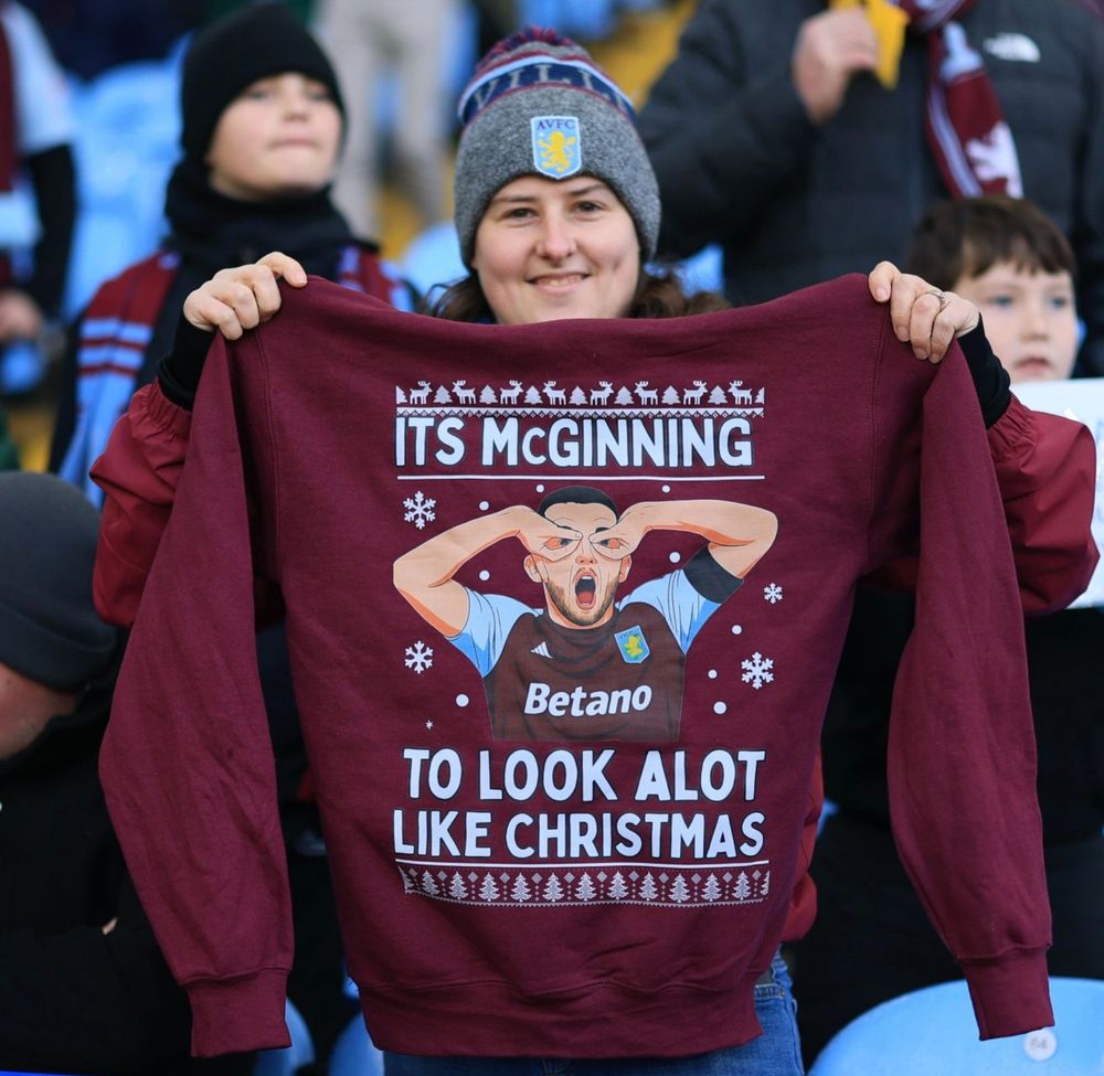 An Aston Villa fan with a John McGinn Christmas jumper