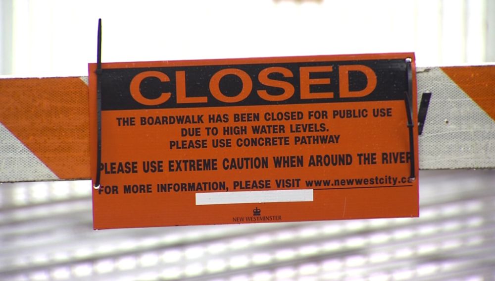 New West boardwalk amid fast-moving water