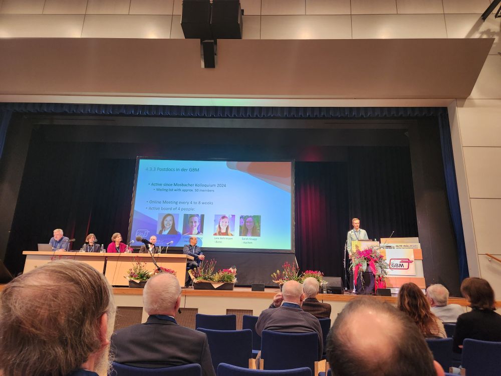Florestan (spokesperson of the GBM Postdocs) introduces our group on stage. The board with its 4 members (including myself) is shown on the slide.