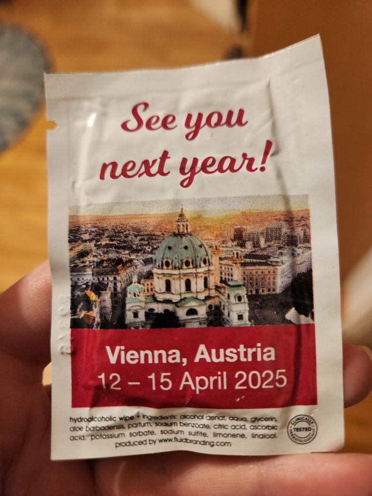 A disinfectant wipe I got at ESCMID Global last year. It says "See you next year! Vienna, Austria 12-15 April 2025"