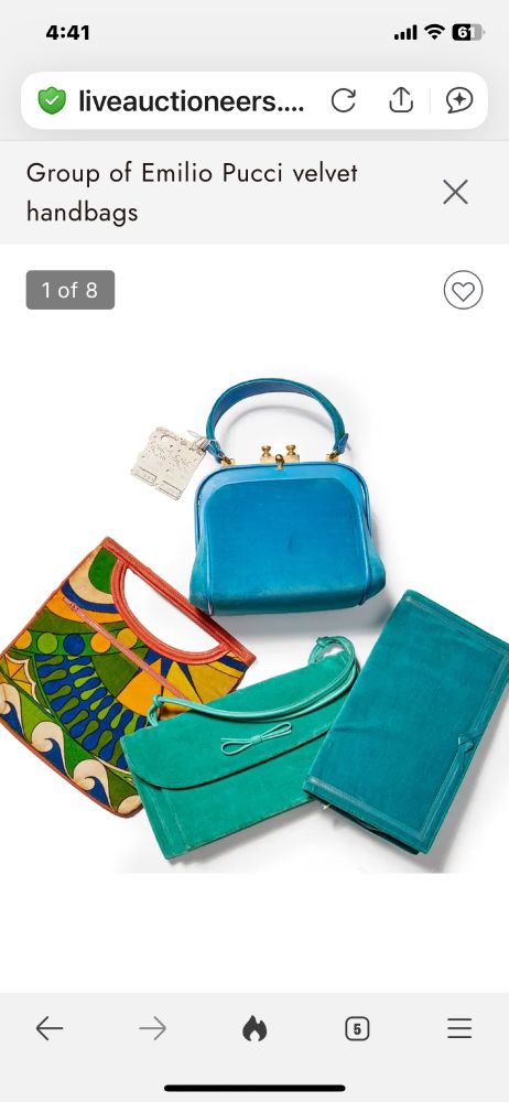 Four peacock colored bags from Iris Apfel auction