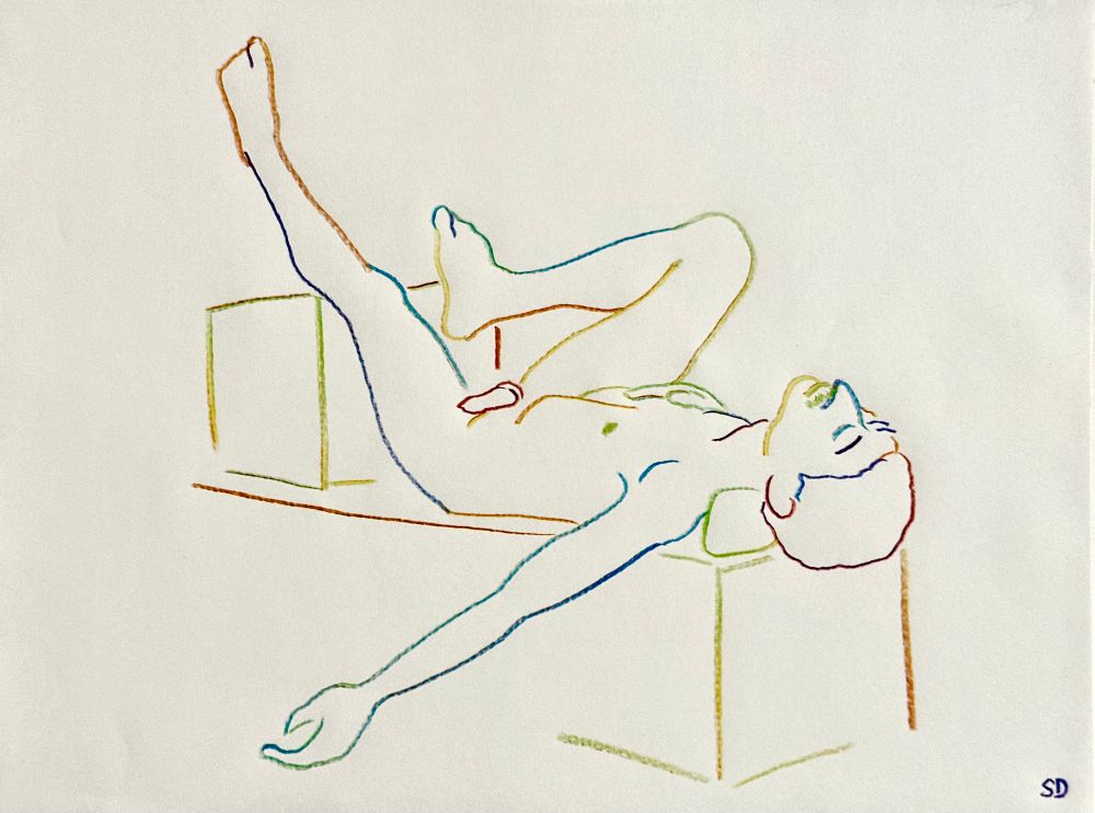 A multicolored pencil sketch in a simple line style of a nude model reclining on a bench, foot and leg propped up with a cube, head back while one arm hangs to the side, and the other hand rests on the chest. An intact penis hangs to one side.