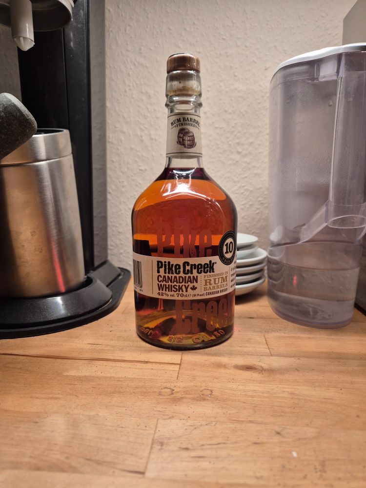 a bottle of canadian pike creek whisky.