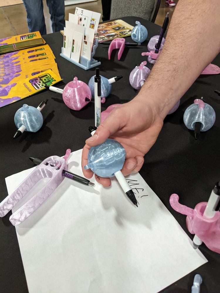 A ball shaped pen holder.
