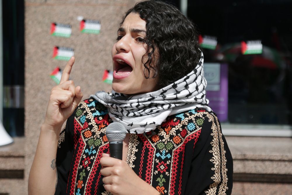Protest outside Barclays Bank, Belfast, 09.08.25. With guest speaker Dr. Shahd Hammouri - Lecturer in International Law and Legal Theory. Photo by Stuart Bailie.