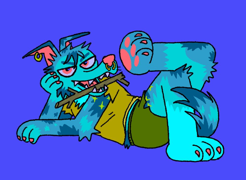 a blue/teal dog posing with a stick in their mouth. they are lounging, yet seem ready for any kind of trouble.