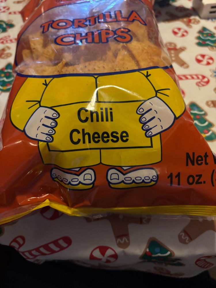Taco works of san luis obispo tortilla chips that says chili cheese kinda like goatse but close up