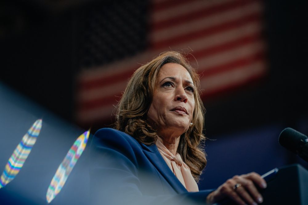 Harris downplays gender, a shift in strategy from Clinton in 2016