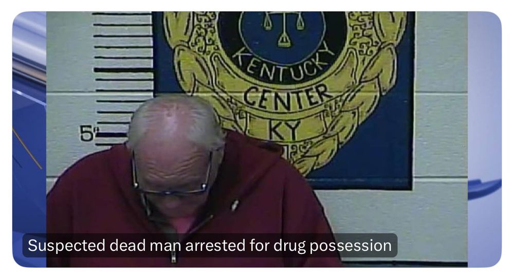 Mugshot of a suspected dead man arrested for drug possession, in which the suspect is slumped over and not looking at the camera, as if he’s actually dead and not just higher than groceries