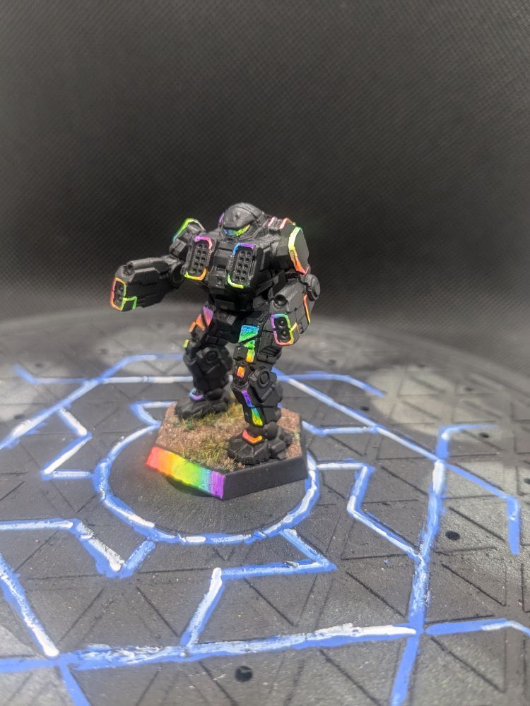 Dervish painted black with rainbow accents like RGB lights. 