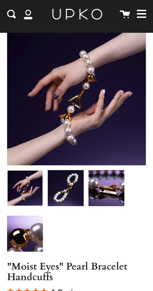 screenshot of a pair of decorative “bracelet handcuffs” made of big pearls.