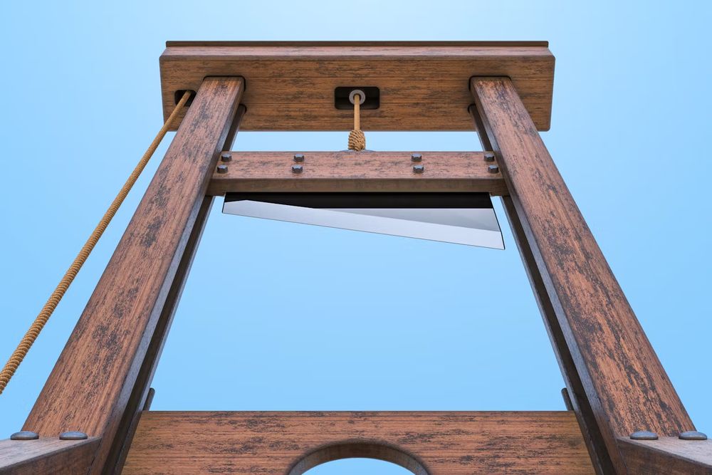 A photo looking up at a guillotine blade.  I hope this is the last thing that the piece of shit terrorist Donald Trump sees before he dies.