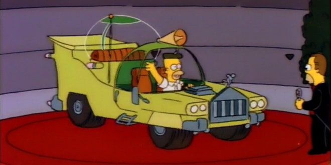 Homer Simpson sat in the car he designed in Season 2 Episode 15