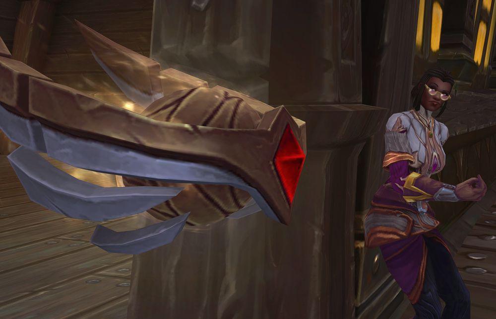 A menacing mechanism sits in the doorway as a feminine figure leans against the door frame, peering at it.