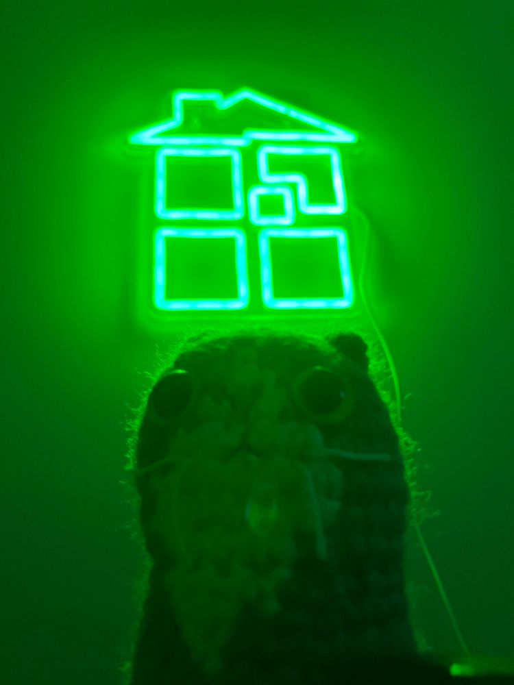 The Stinkoid sitting under the Homestuck Light