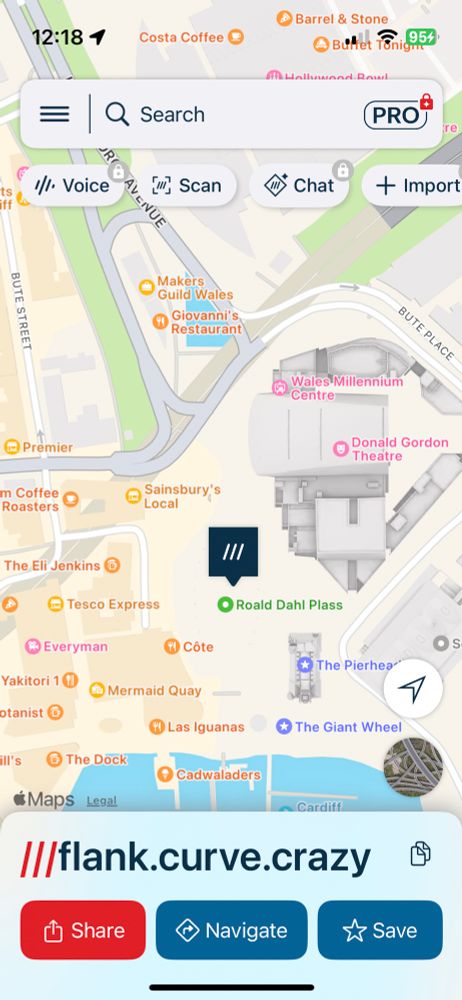 A screenshot from the What3Words app. The address searched is ///flank.curve.crazy. The location found is in the centre of the Millennium Plaza in Cardiff bay