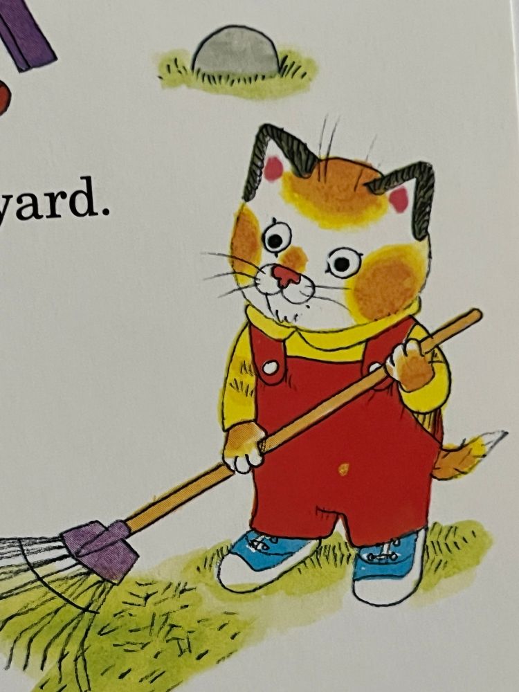 A kid cat using a rake and spacing out
