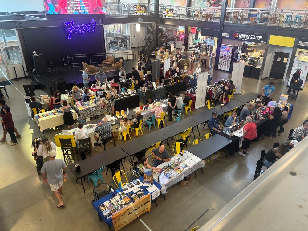 Overhead view of authors tabling at Authors’ Day.
