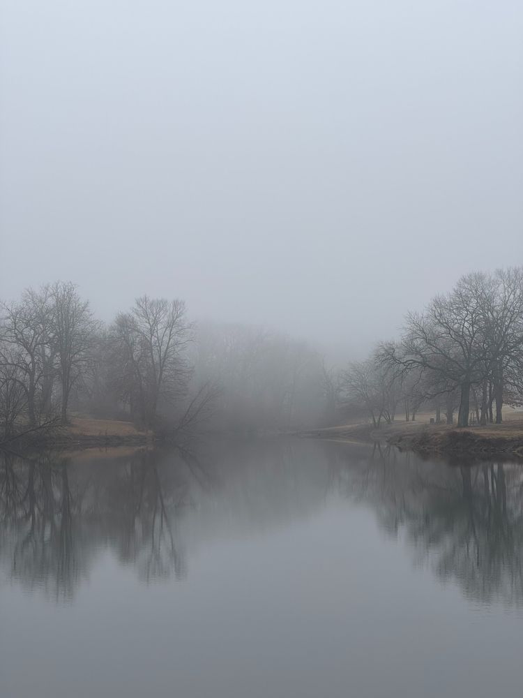 Image of lake covered with fog.