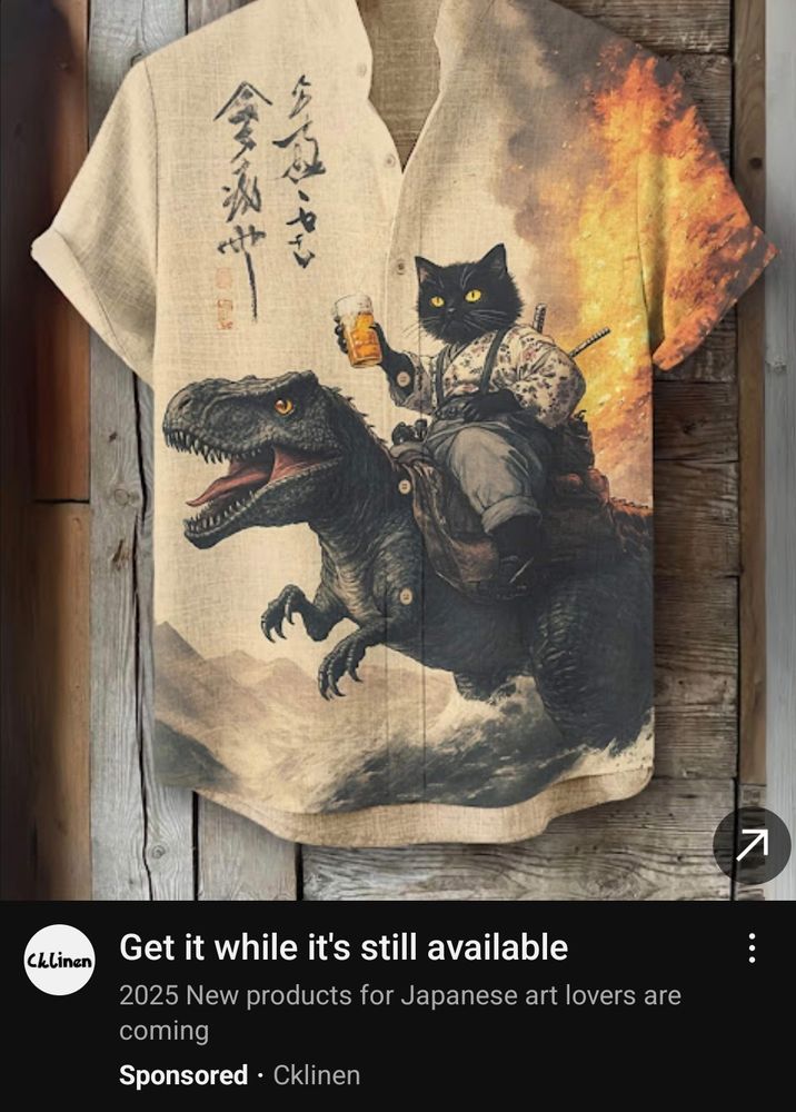 The same dino-riding samurai cat shirt 