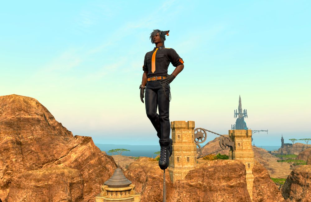 A miqo'te male dressed in black with shiny orange accents and tie stands high above on the end of a flag pike, standing straight with one hand on his hip and one foot against the other's heel. He looks to the horizon.
