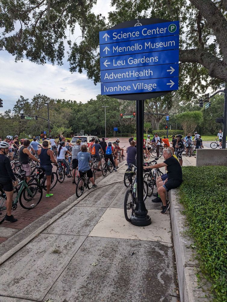 A WHOLE bunch of bikes in the street 