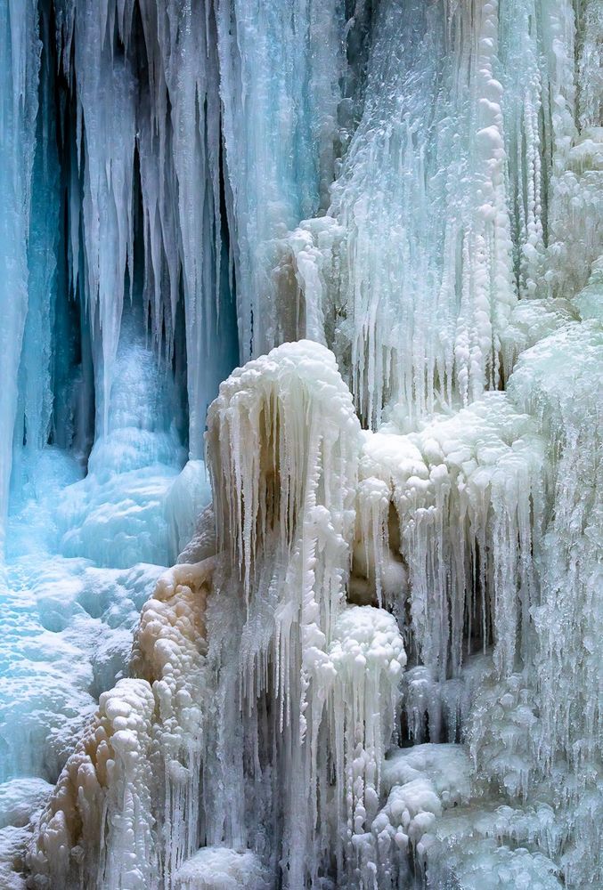 A frozen waterfall  with pinnacles of ice