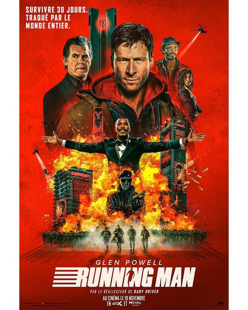 affiche de running man : josh brolin regard caméra, josh brolin à ses côtés, devant un immeuble, plein de flammes autour de colman domingo, et un fond rouge pétard