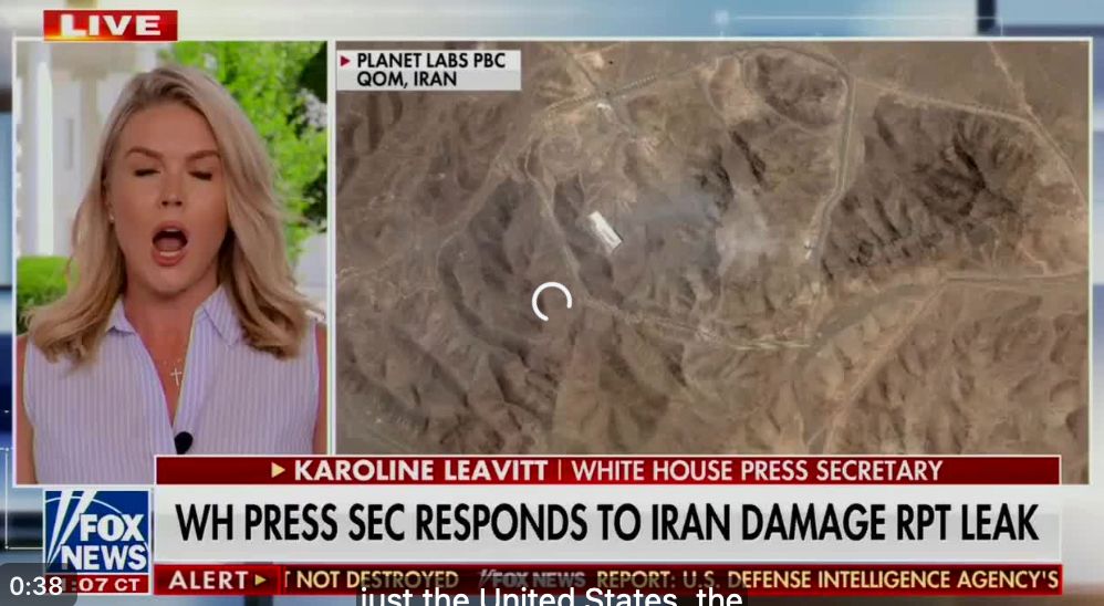 a snapshot of a video of Karoline Leavitt. the video is frozen with her mouth wide open and her eyes closed, next to a chyron about her responding to the leak of the Iran damage report.
