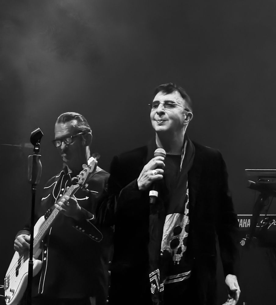 Marc Almond and band member in black & white.