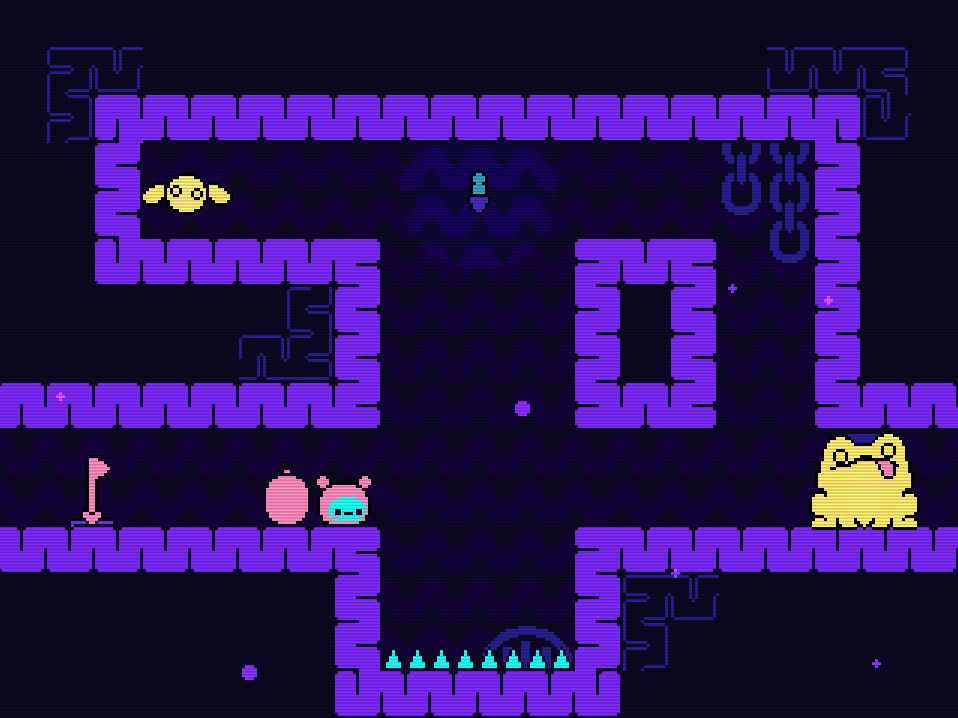 A screenshot of the game Öoo featuring a bomb caterpillar, a large frog, and a fly.