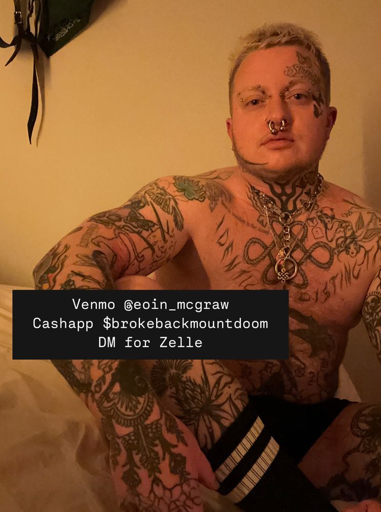 Eoin, a heavily tattooed white trans man, sits on his bed in boxers and socks. A text block over him reads: Venmo @eoin_mcgraw, cashapp $brokebackmountdoom, DM for Zelle