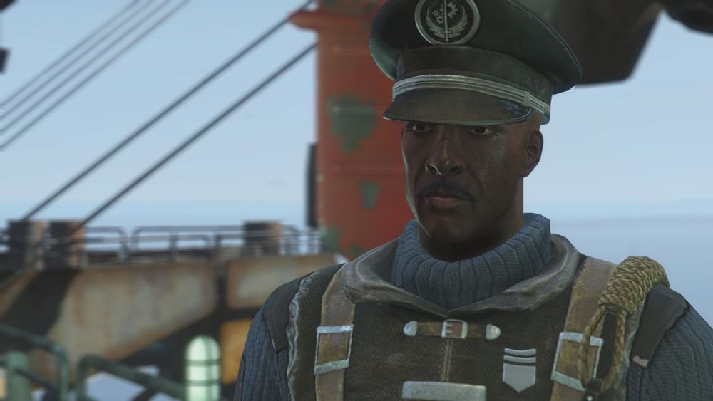 Lancer-Captain Kells of the Brotherhood of Steel in the video game Fallout 4. He's a black man with a mustache wearing military dress-style hat and a turtleneck sweater with uniform overtop. He's standing on the deck of an air ship.