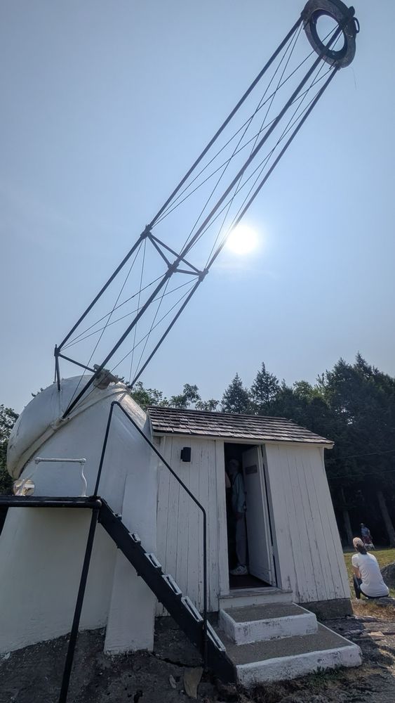 The Porter Observatory with the mirror in position and the sun overhead.